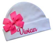 Load image into Gallery viewer, Newborn Personalized Embroidered Baby Hat in Script Font with Custom Name and Bow
